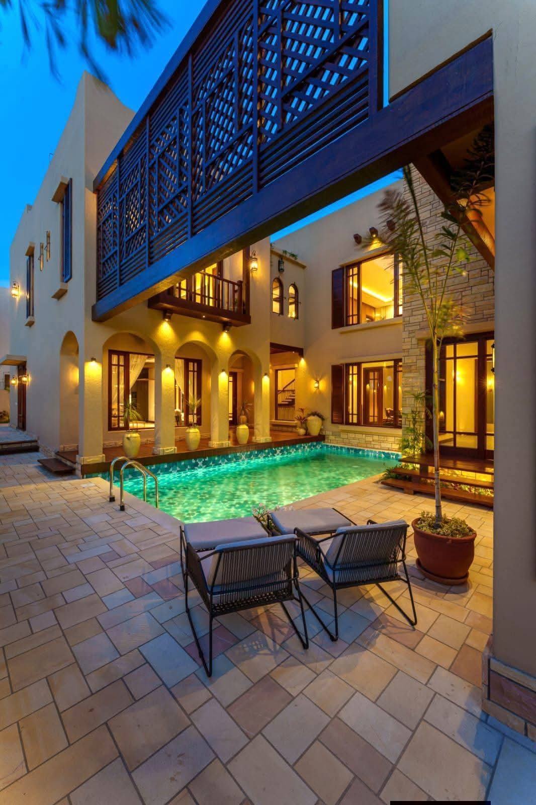 Courtyard swimming pool at dusk