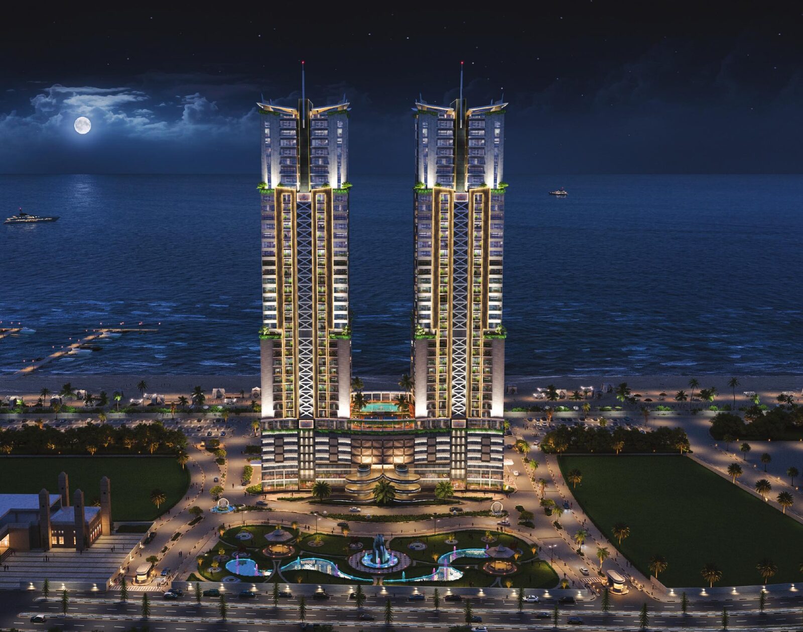 The Trillium twin towers at night over the Arabian Sea